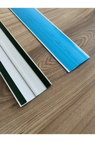 Protective adhesive film preserving aluminium profile surface finish during transit