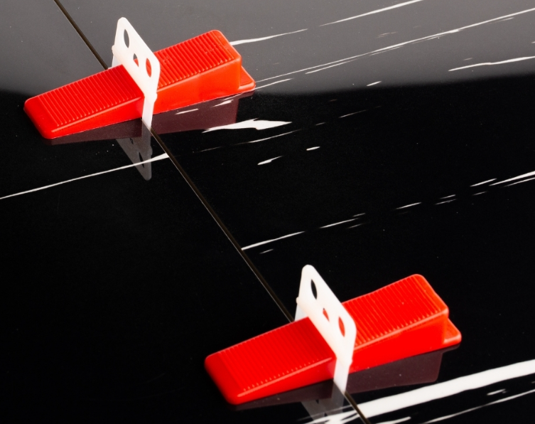 Tile leveling systems — clips, wedges and pliers