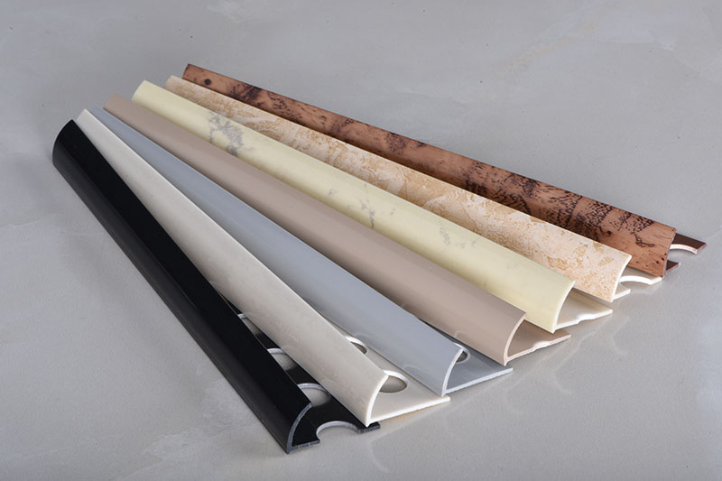 PVC decorative profiles — wood grain and marble finish edge trims for building materials